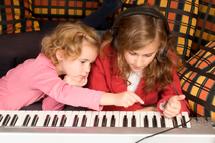 Music and movement experiences build friendships, too!